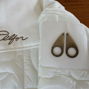 Moose Knuckles White Jacket with Black and Gold Logo